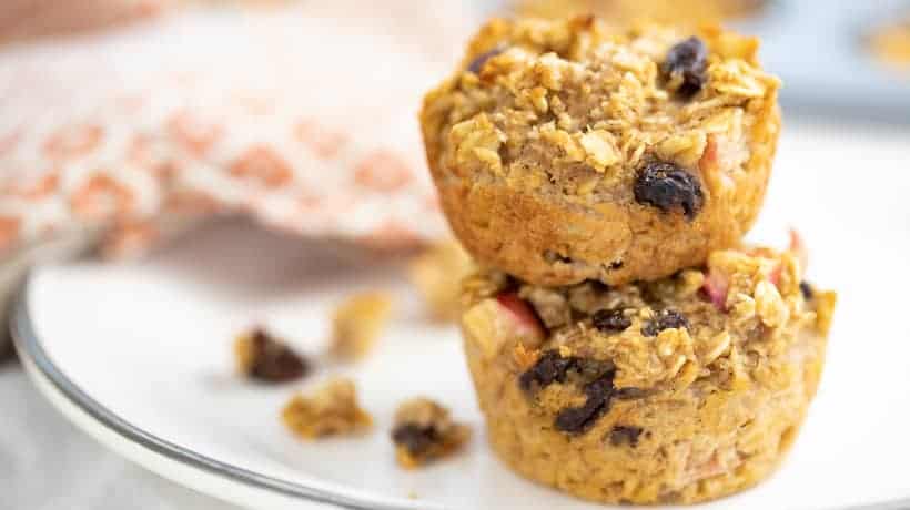 apple oatmeal muffin cups stacked on top of each other