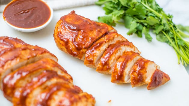 sliced chicken on white cutting board