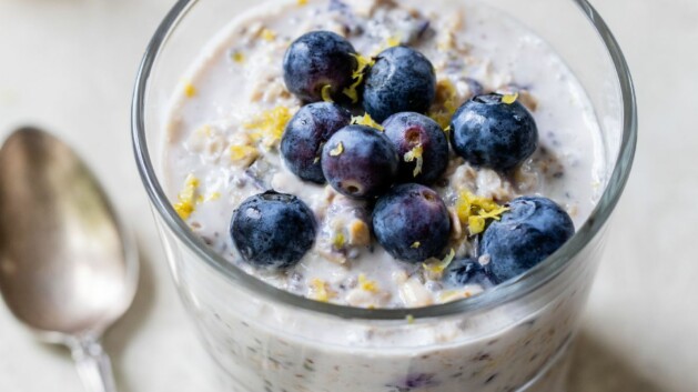 Blueberry lemon overnight oats in a small glass.