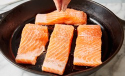 seasoning salmon in cast iron skillet