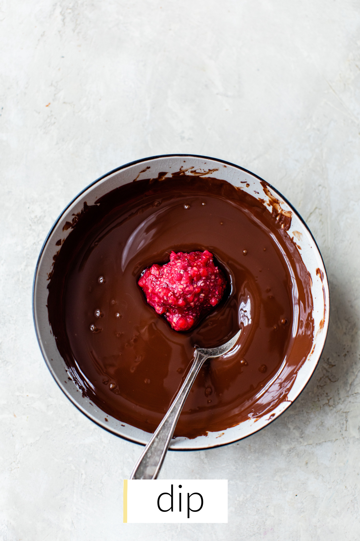 raspberry chia bites dipped and coated in dark chocolate