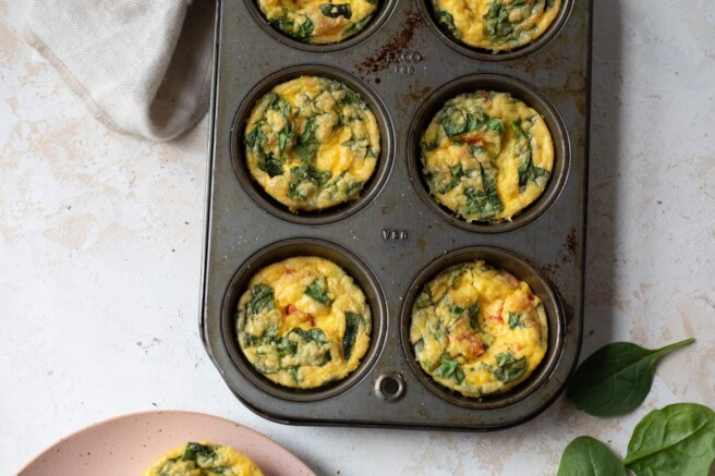 Baked egg bites in a muffin pan.
