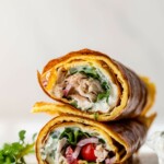 Cottage cheese flatbread wrap filled with chicken, greens and other veggies.