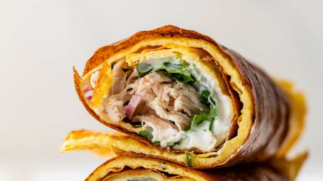 Cottage cheese flatbread wrap filled with chicken, greens and other veggies.