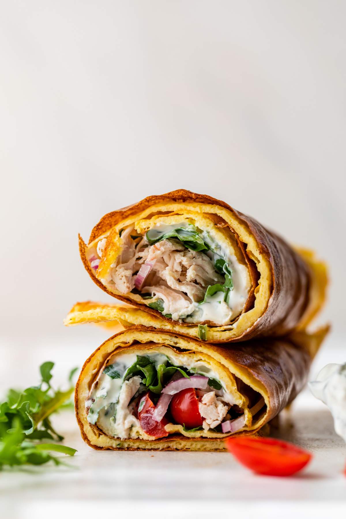 Cottage cheese flatbread wrap filled with tuna, greens and other veggies.
