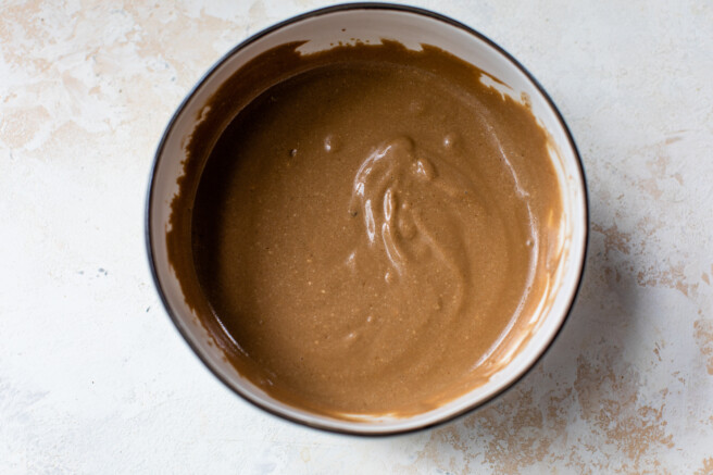 creamy balsamic dressing whisked together in a small bowl