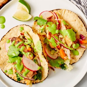 fish tacos on white plate