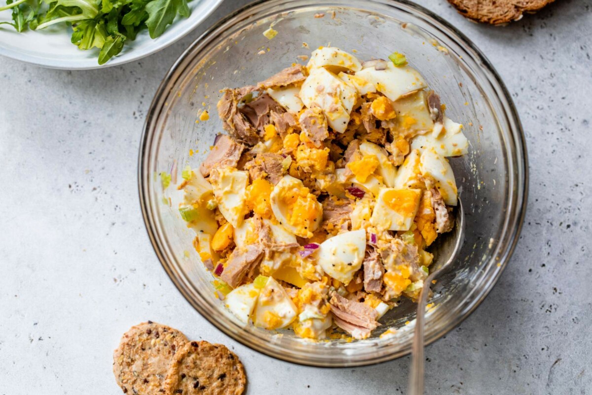 Tuna salad with egg in a large bowl.