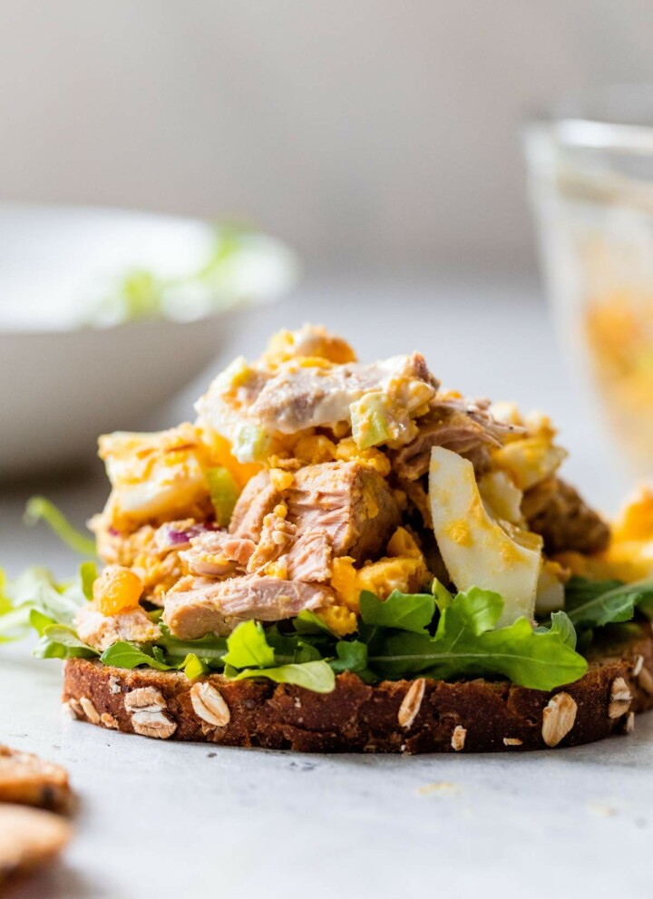 Egg Tuna Salad piled on a slice of bread with lettuce.