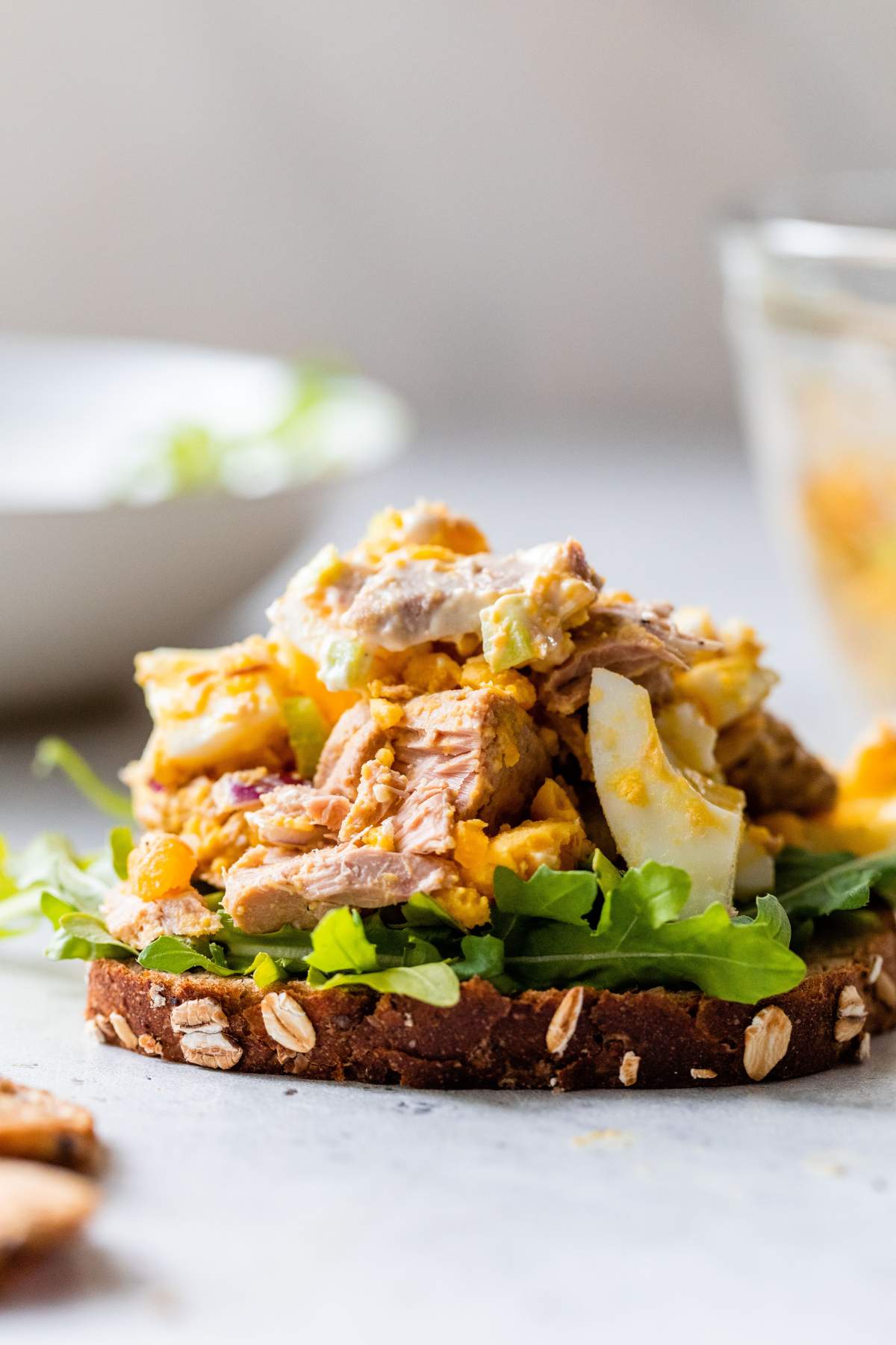 Egg Tuna Salad piled on a slice of bread with lettuce.