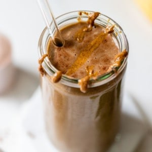chocolate protein shake topped with almond butter