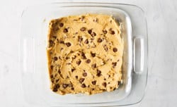 batter spread in baking dish ready to bake