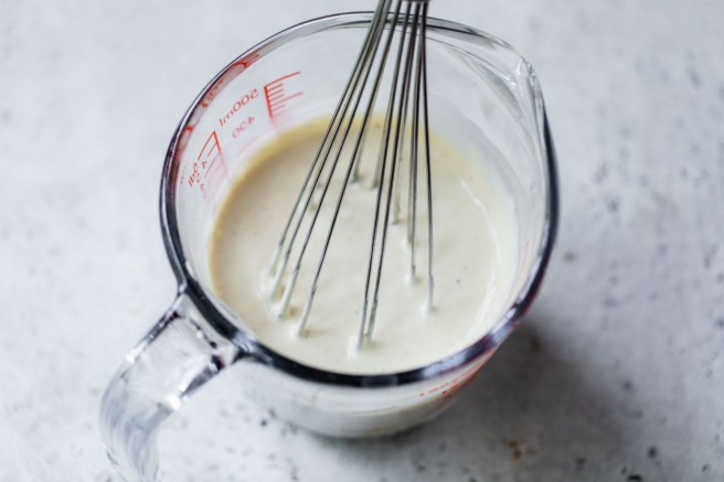 Making dressing for macaroni salad.