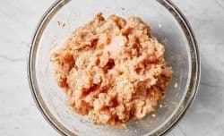 raw ground turkey in mixing bowl