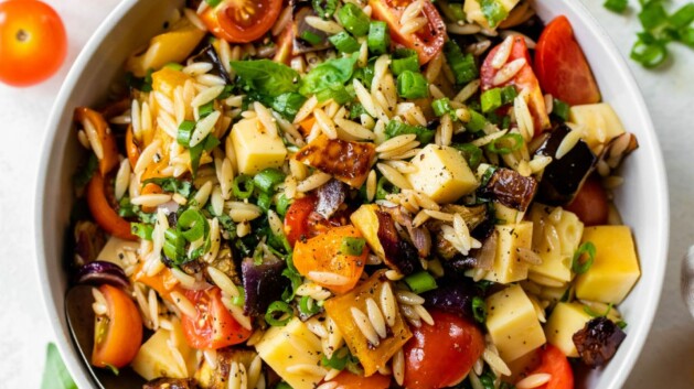 Pasta salad made with orzo and roasted vegetables.