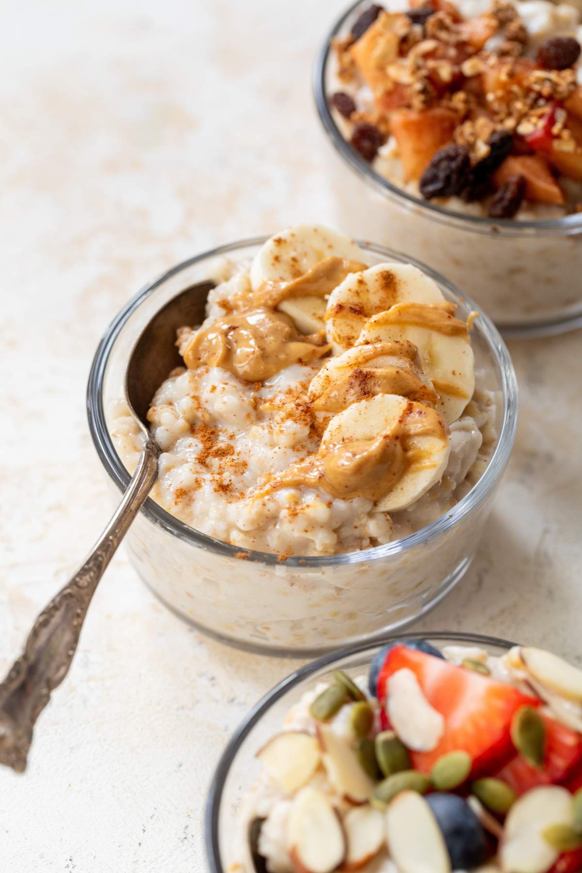 Steel cut oats topped with banana slices and peanut butter.
