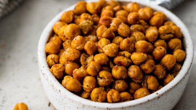 Roasted chickpeas in a small white bowl.