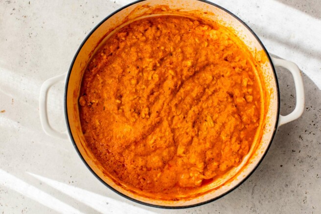 Turkey bolognese with cottage cheese simmering in a pot.